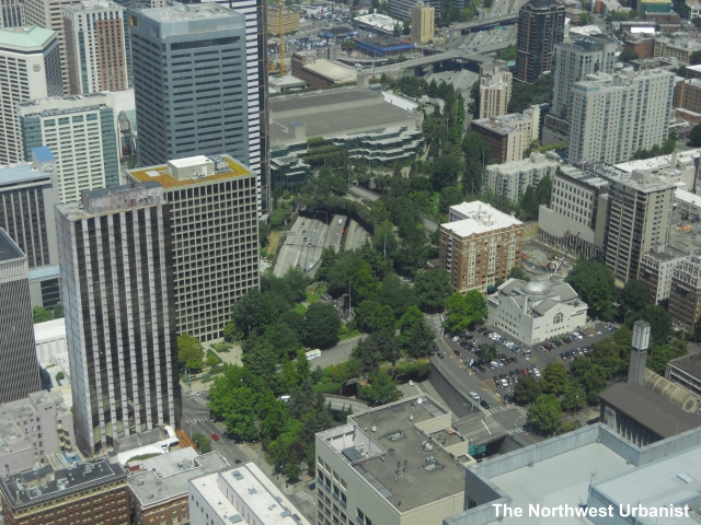 I-5 has already been spanned with Freeway Park and the Convention Center.